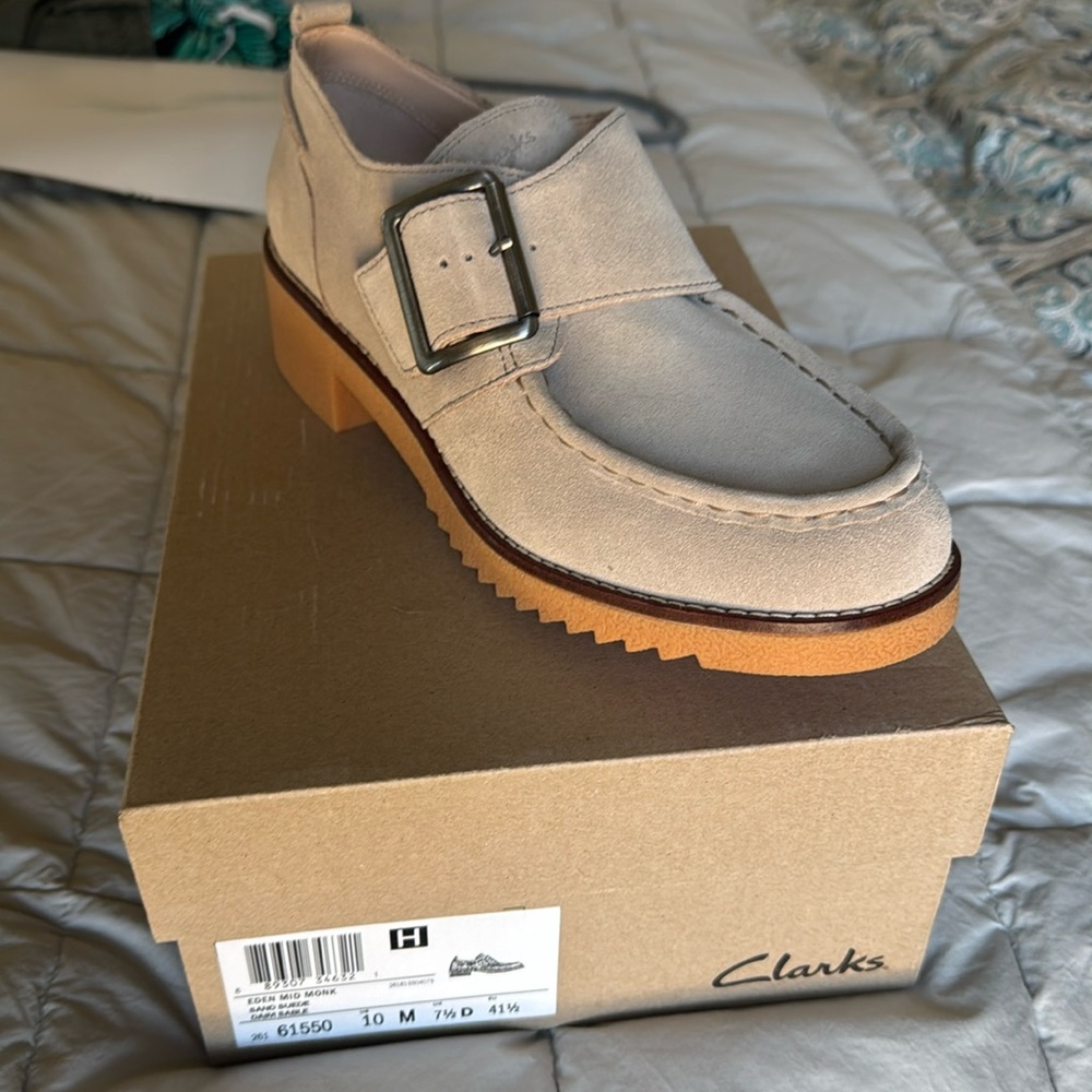 Clarks Cream Loafers with Brown Sole